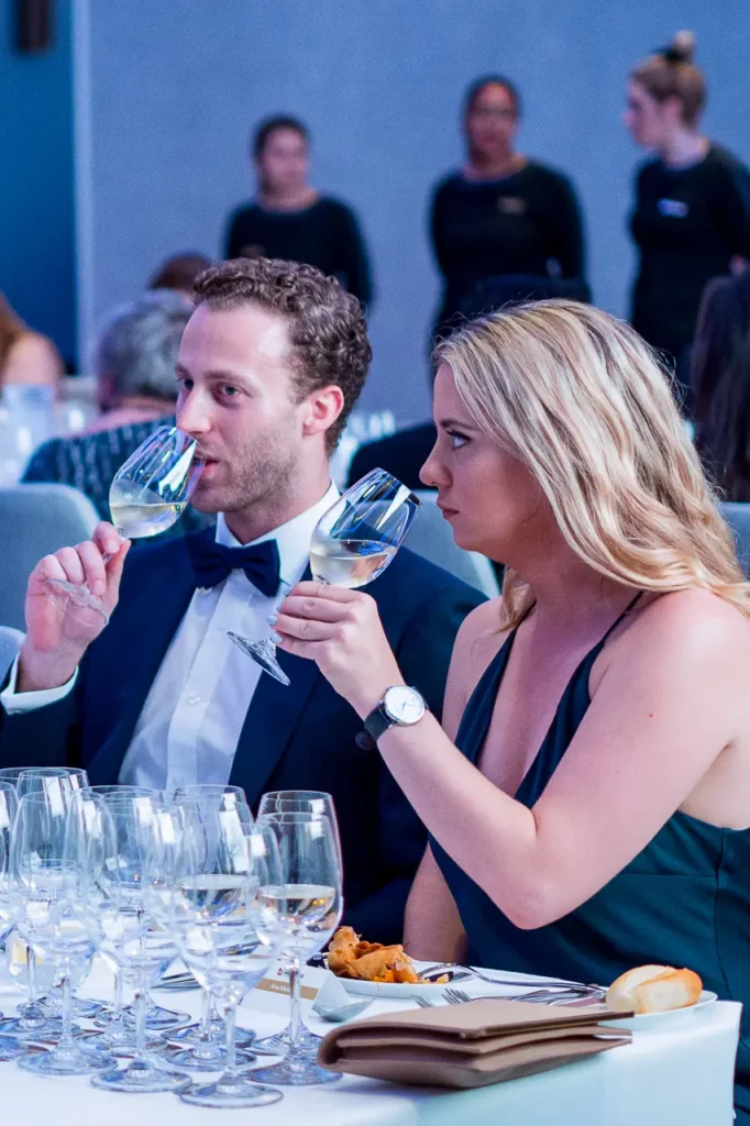 Guests tasting white wine during the 2017 Six Nations Wine Challenge dinner