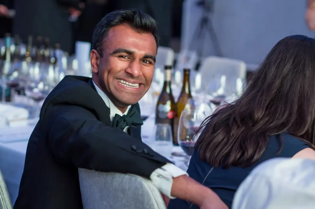 Smiling guest at the Six Nations Wine Challenge gala dinner