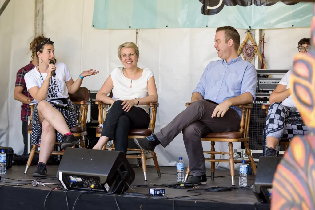 Speakers taking part in a community panel discussion on stage at Glebe Street Fair Sydney