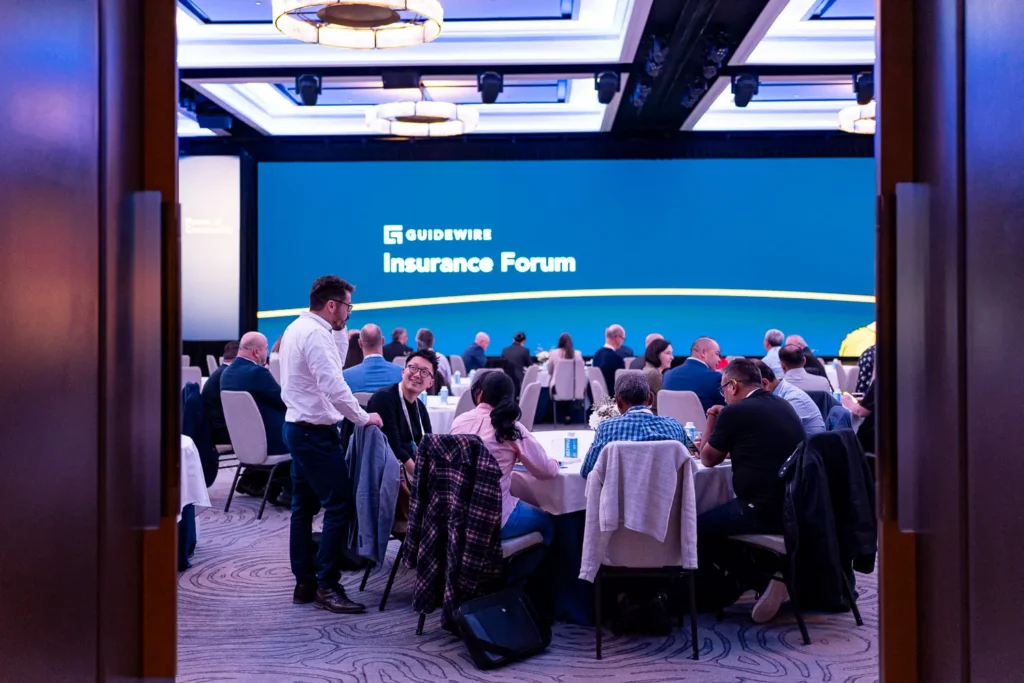 Corporate event guests networking at Four Seasons Hotel Sydney