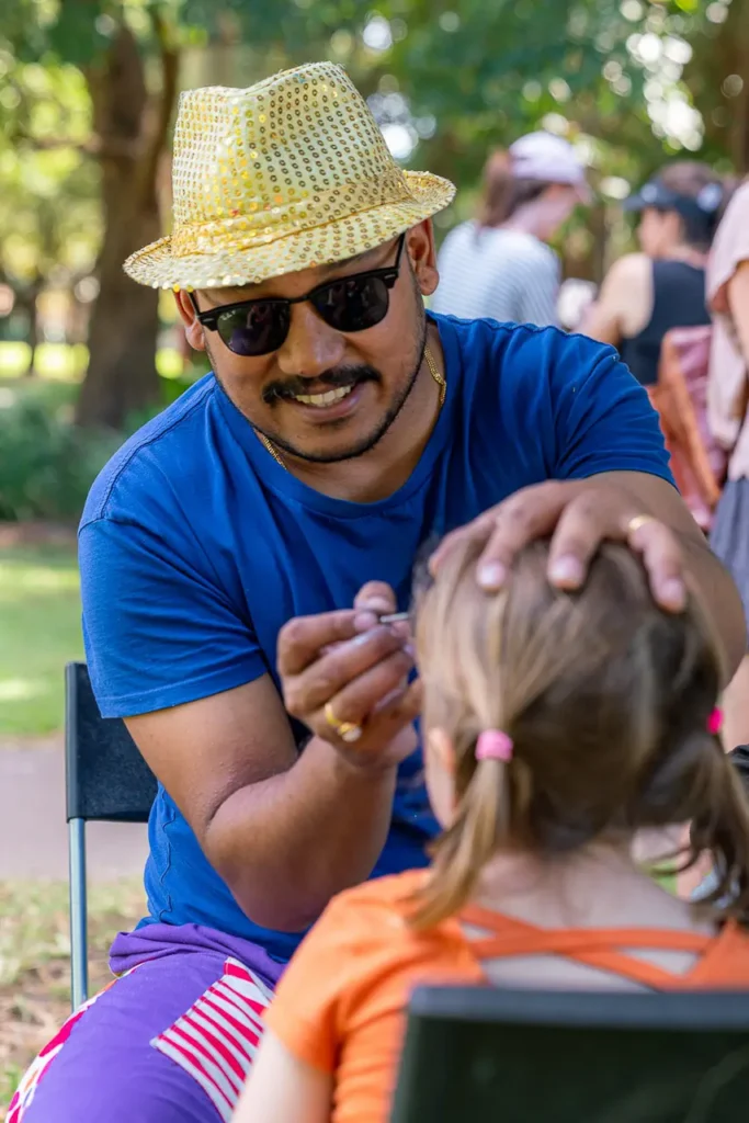 North Sydney event photography capturing face painting at the St Leonards Park playground opening