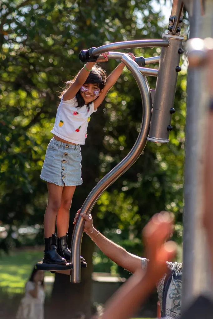North Sydney event photography capturing a child exploring the new playground equipment