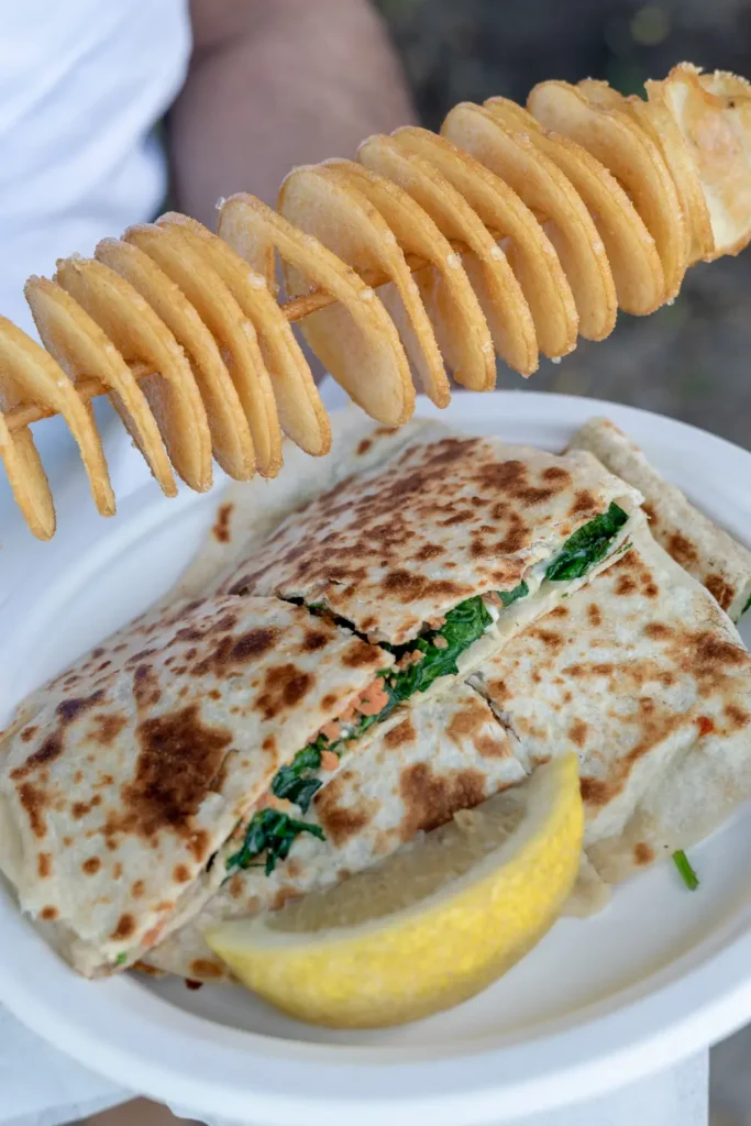 Freshly prepared wraps and spiral potato chips served at the Sunset Series outdoor event