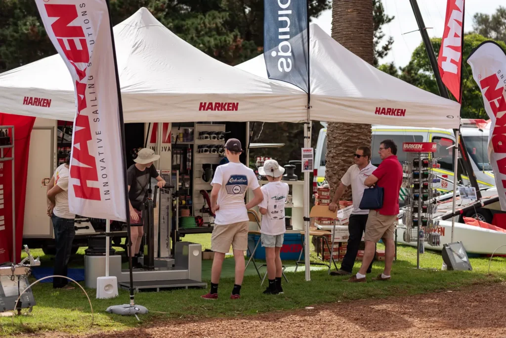 Harken exhibitor stand with visitors photographed at a Sydney sailing expo event