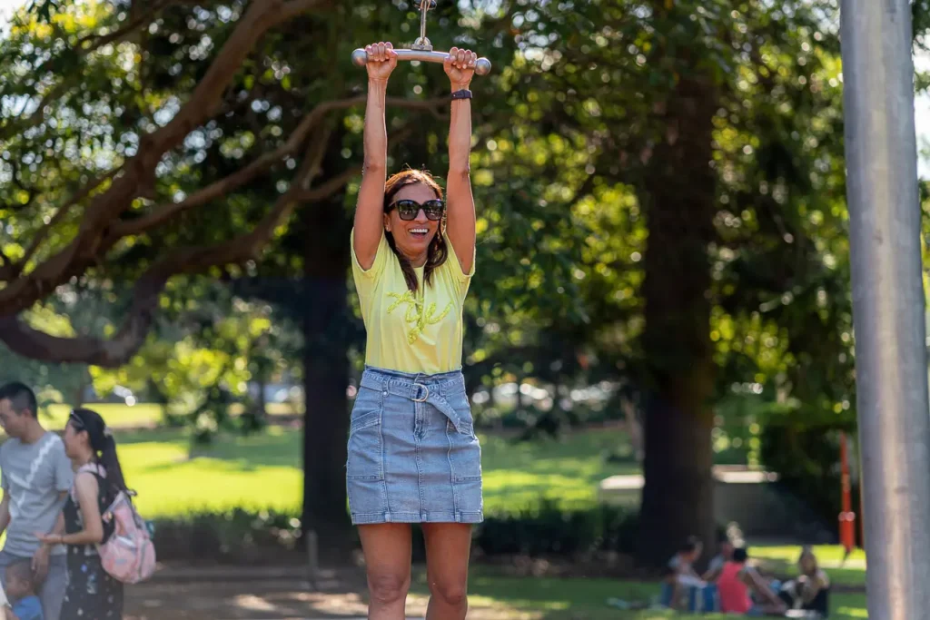Event photography capturing an adult enjoying the flying fox at the St Leonards Park opening