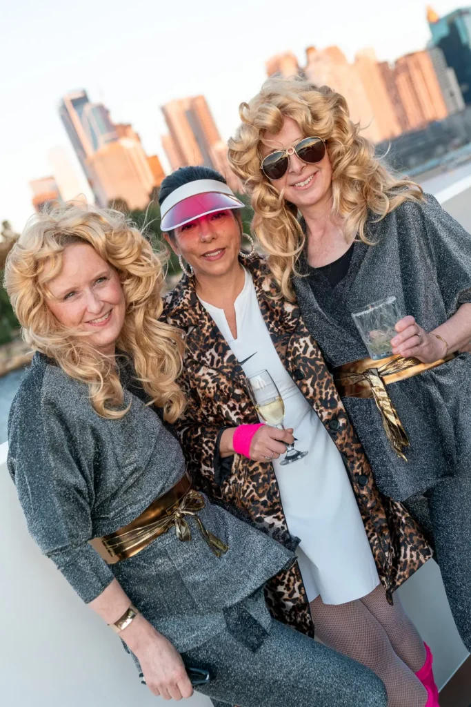 Costumed friends photographed during a Sydney Harbour cruise party