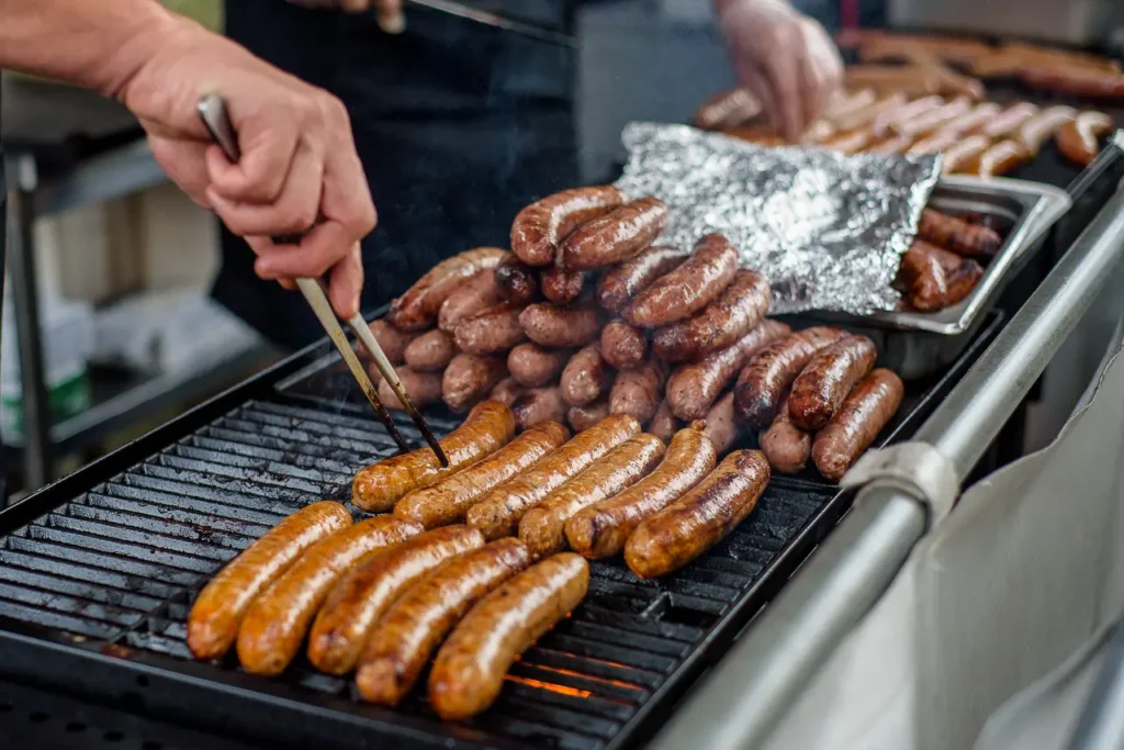 Sausages cooking at a Taste of Manly food stall