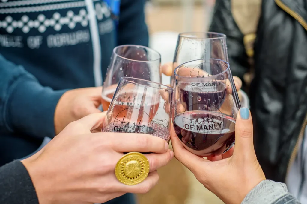 Friends enjoying a wine tasting at Taste of Manly